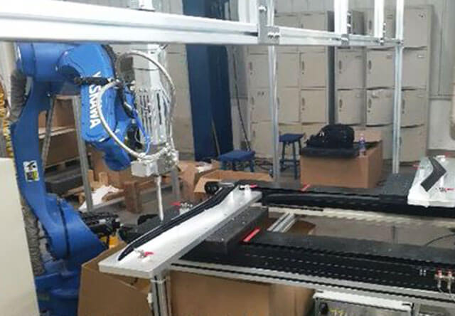 汽車內(nèi)飾件自動(dòng)噴膠機(jī)器人